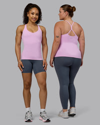 Woman wearing Movement Longline Active Shelf Bra Tank - Pastel Orchid | Thumbnail Index: 5
