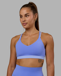 Woman wearing Nexus Sports Bra - Indulgent Blue | Thumbnail Index: 0