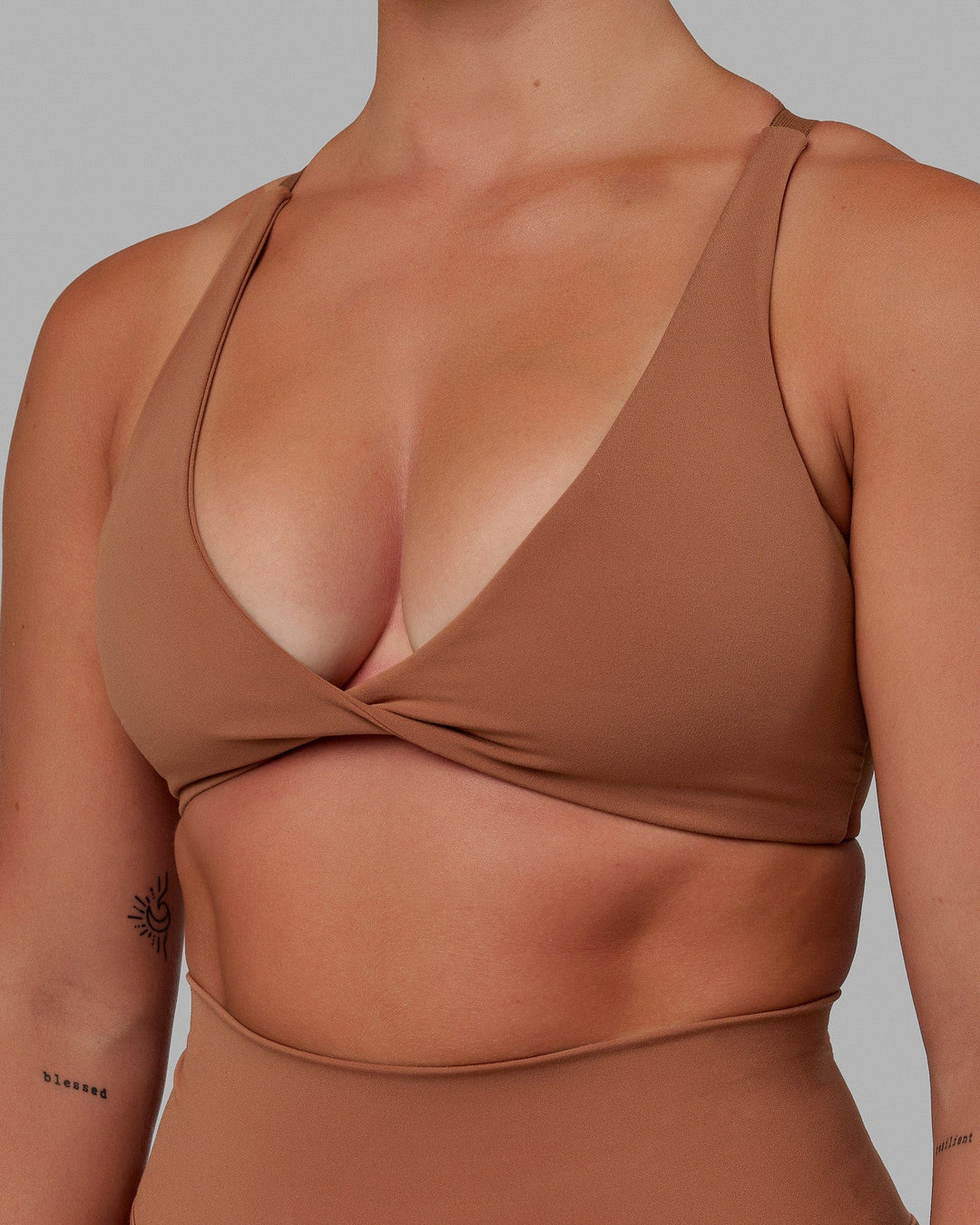 Woman wearing Nimble Sports Bra - Brick - view 4