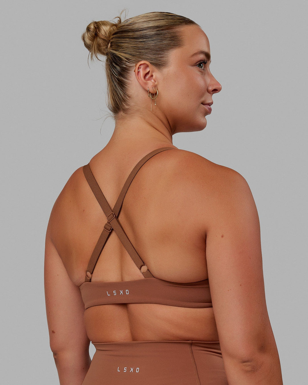 Woman wearing Nimble Sports Bra - Brick - view 7