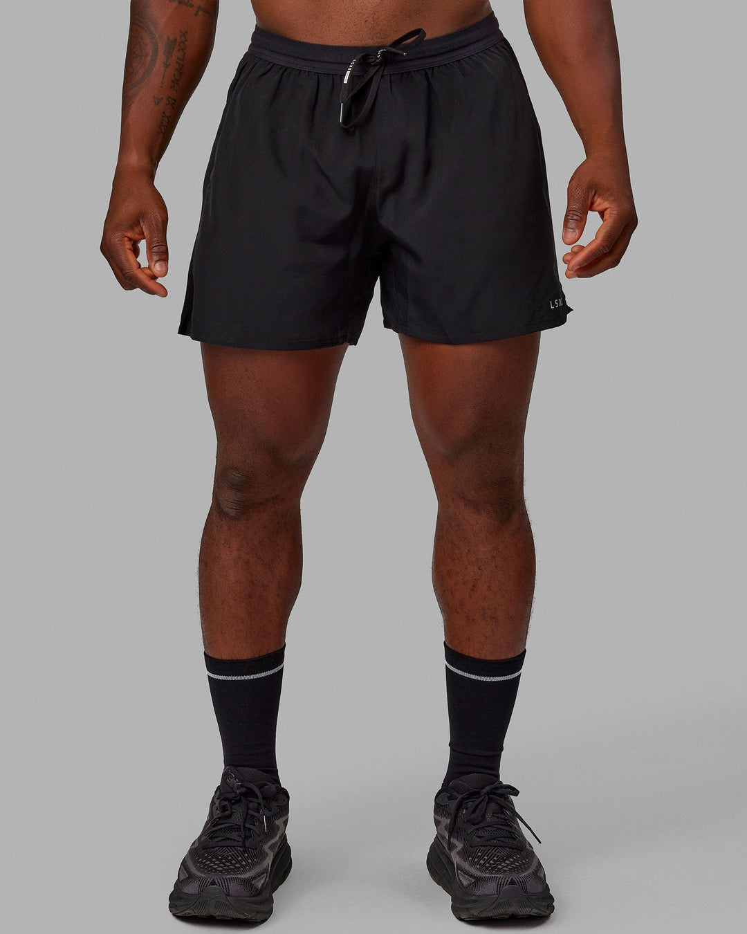 Man wearing Pace 5" Lined Performance Shorts - Black-Reflective - view 1