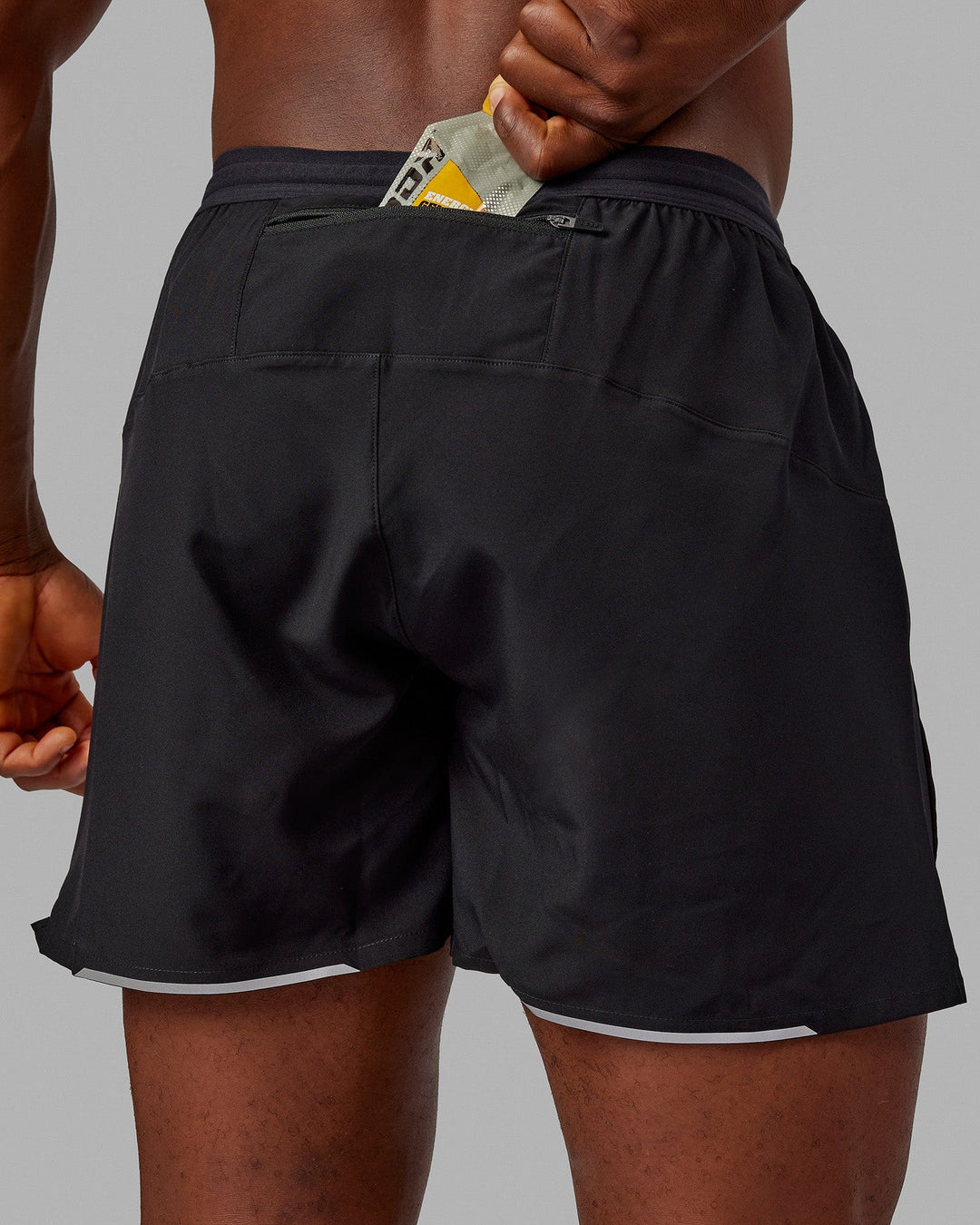 Man wearing Pace 5" Lined Performance Shorts - Black-Reflective - view 4