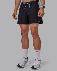 Man wearing Pace 5" Lined Performance Shorts - Black-Retro Blue | Thumbnail Index: 5