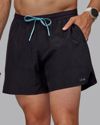 Man wearing Pace 5" Lined Performance Shorts - Black-Retro Blue | Thumbnail Index: 8