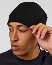 Man wearing Pace Beanie in Black  | Thumbnail Index: 0