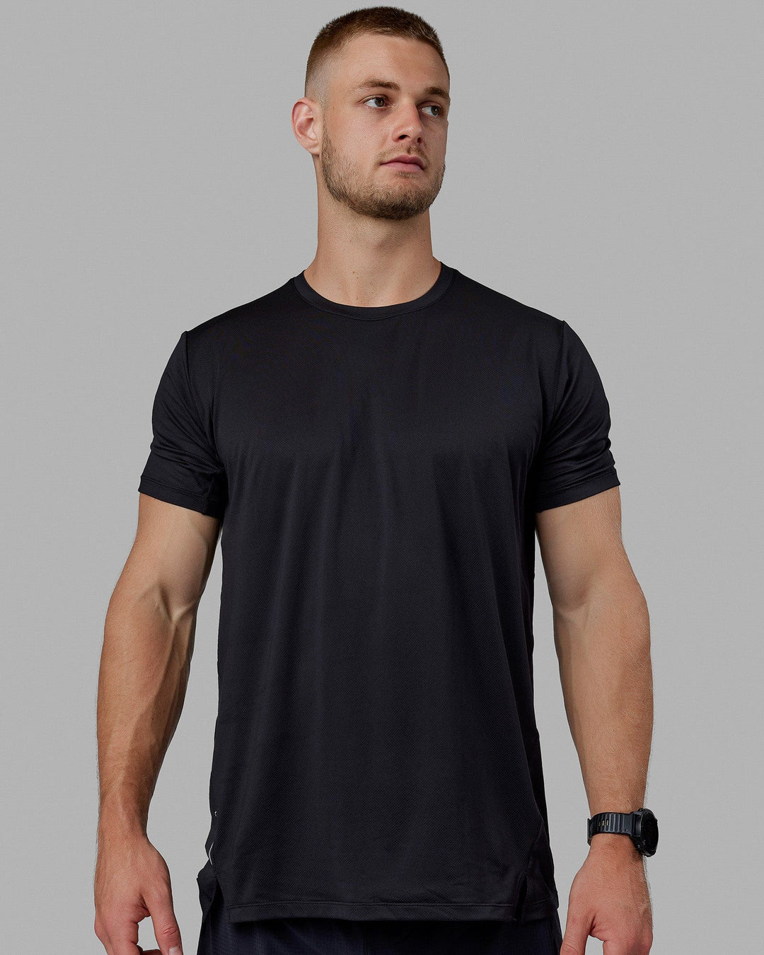 Man wearing Pace Running Tee - Black - view 1