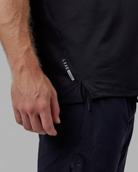 Man wearing Pace Running Tee - Black | Thumbnail Index: 2