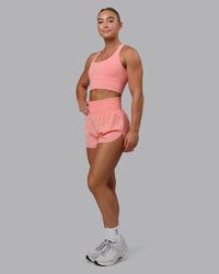 Woman wearing Power Train 2" Shorts - Murex Shell | Thumbnail Index: 5