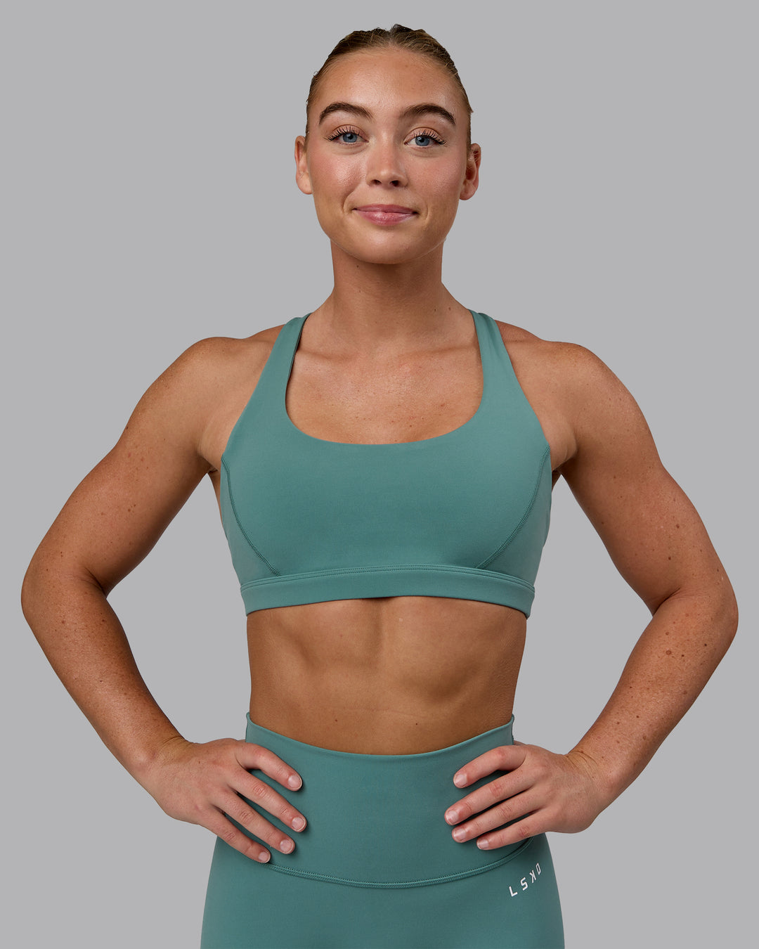 Woman wearing Precision Sports Bra - Sagebrush - view 2