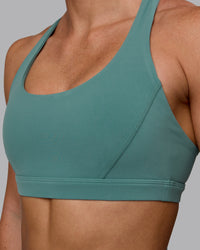 Woman wearing Precision Sports Bra - Sagebrush | Thumbnail Index: 7