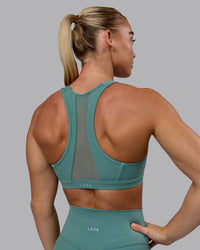 Woman wearing Precision Sports Bra - Sagebrush | Thumbnail Index: 6