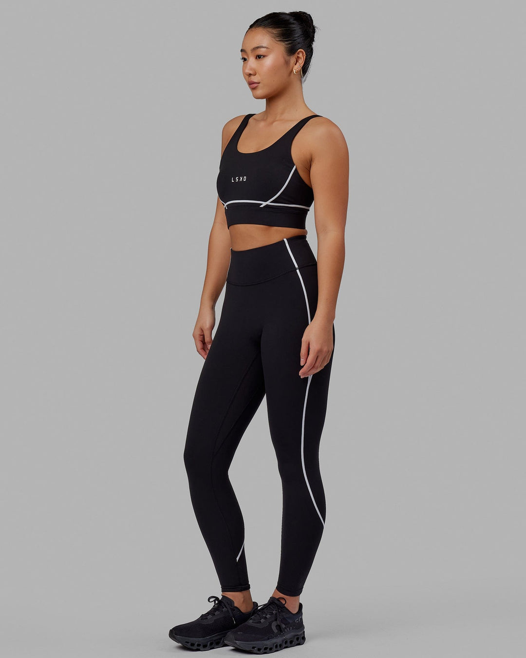 Woman wearing Pulse Sports Bra - Black - view 3