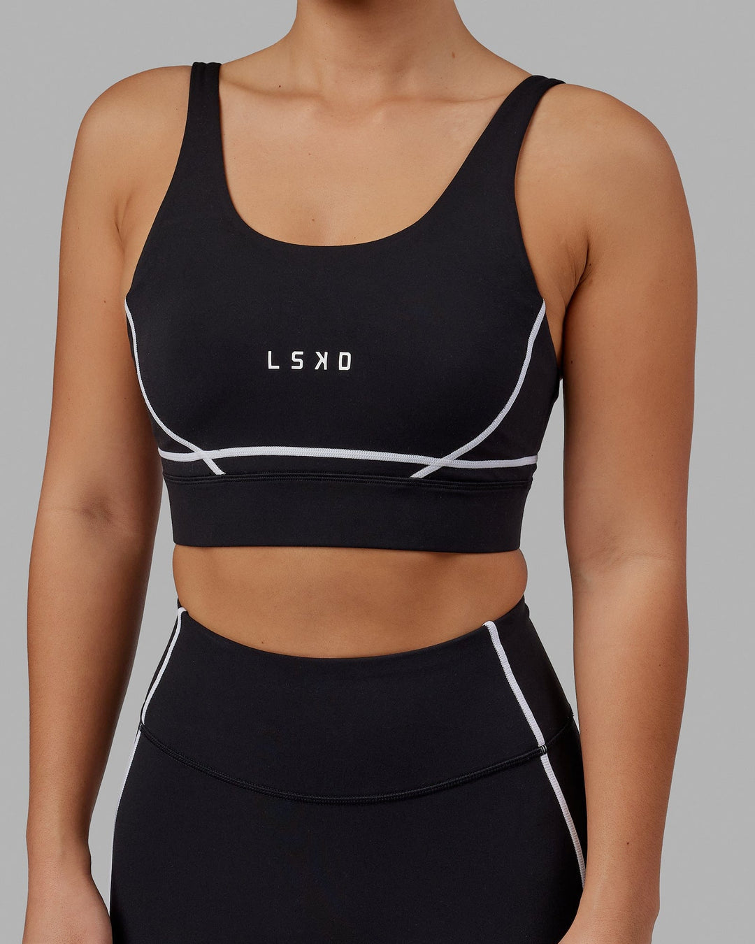 Woman wearing Pulse Sports Bra - Black - view 8