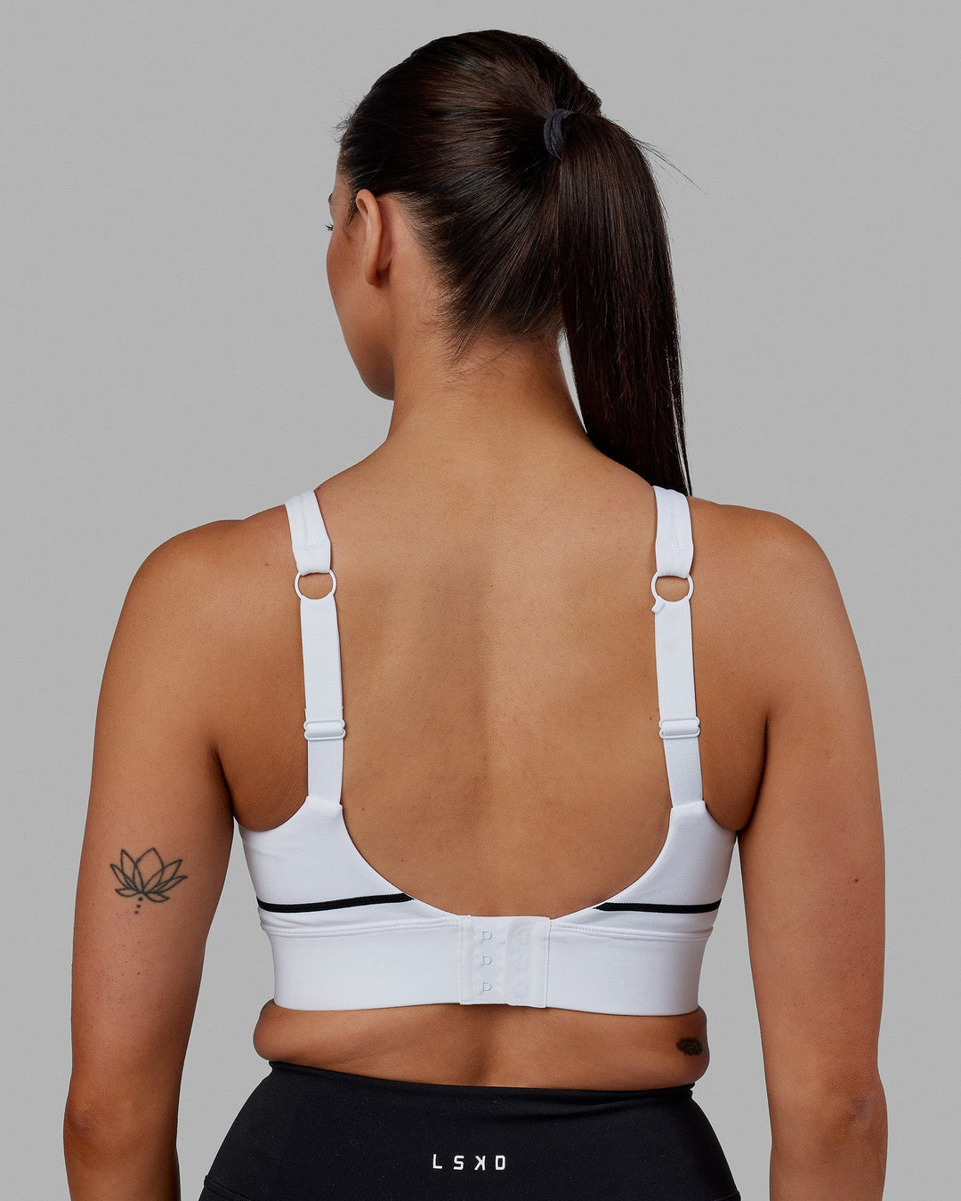 Woman wearing Pulse Sports Bra - White - view 5