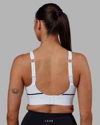 Woman wearing Pulse Sports Bra - White | Thumbnail Index: 4