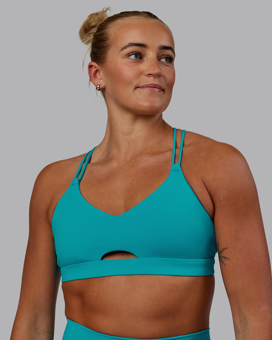 Woman wearing Pursue Sports Bra - Blue Bird - view 3