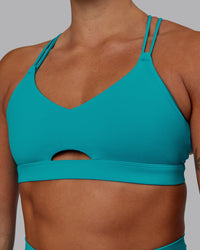 Woman wearing Pursue Sports Bra - Blue Bird | Thumbnail Index: 5