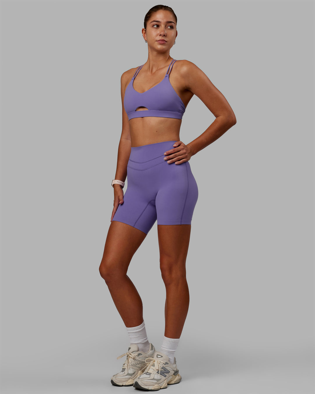 Woman wearing Pursue Sports Bra - Dahlia Purple - view 3