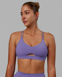 Woman wearing Pursue Sports Bra - Dahlia Purple | Thumbnail Index: 1