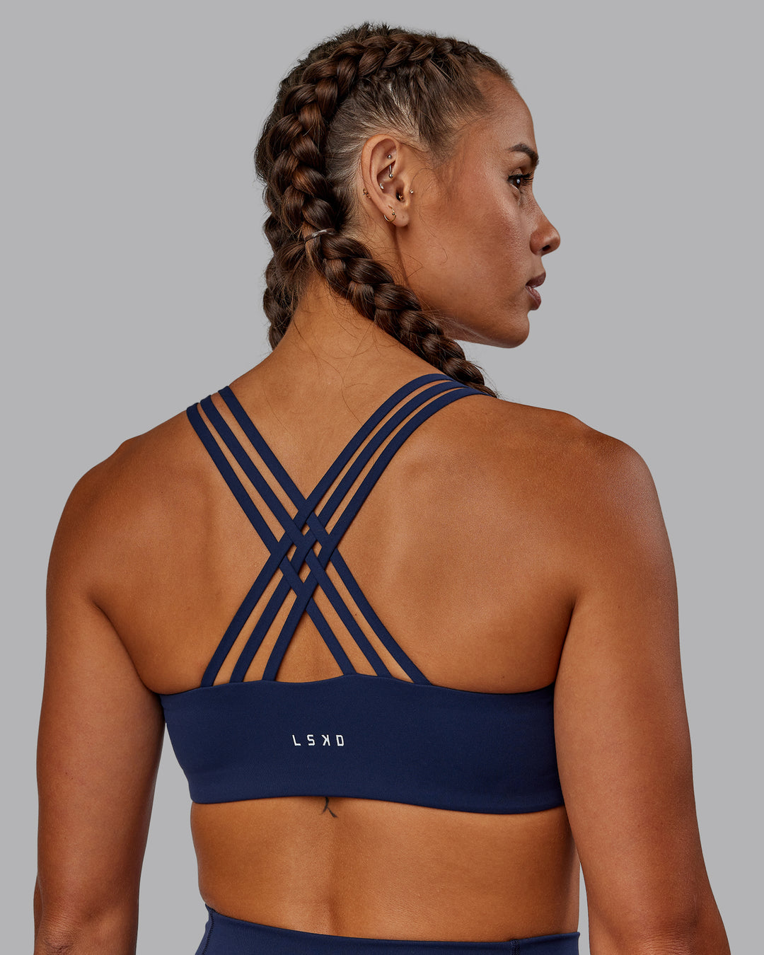 Woman wearing Push The Limit Sports Bra - Future Navy - view 5