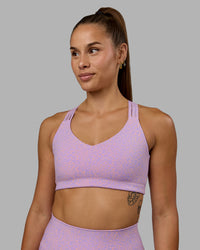 Woman wearing Push The Limit Sports Bra - Pale Lilac Vitality Print | Thumbnail Index: 2