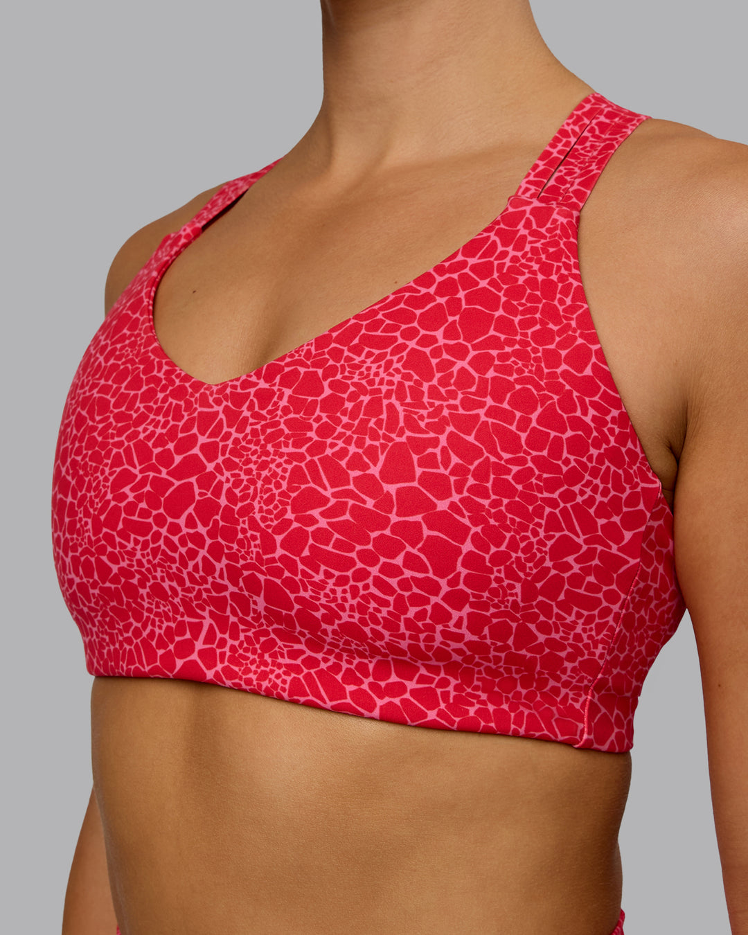 Woman wearing Push The Limit Sports Bra - Red Vitality Print - view 3