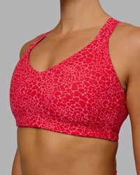 Woman wearing Push The Limit Sports Bra - Red Vitality Print | Thumbnail Index: 2