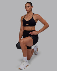 Woman wearing RXD High-Rise 6" Short - Black | Thumbnail Index: 7