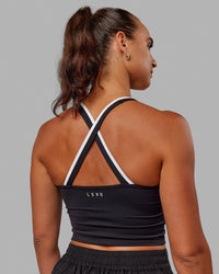 Woman wearing Reflection Active Tank - Black-White | Thumbnail Index: 1