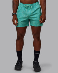 Man wearing Rep 5" Performance Shorts - Topographic Blue Bird | Thumbnail Index: 5