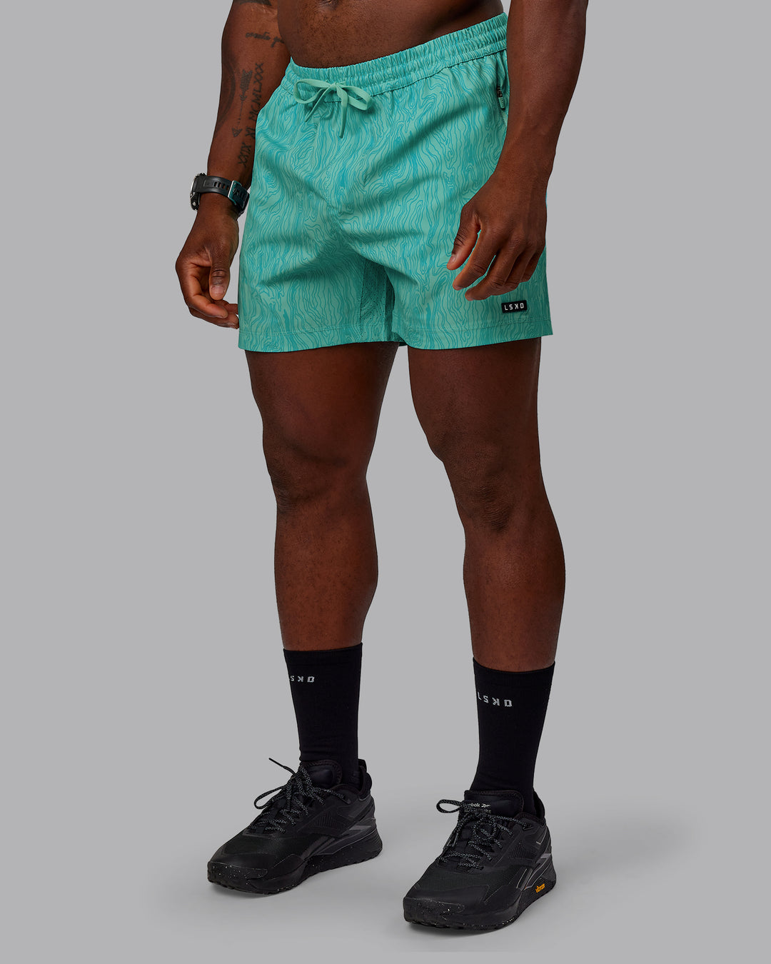 Man wearing Rep 5" Performance Shorts - Topographic Blue Bird - view 1