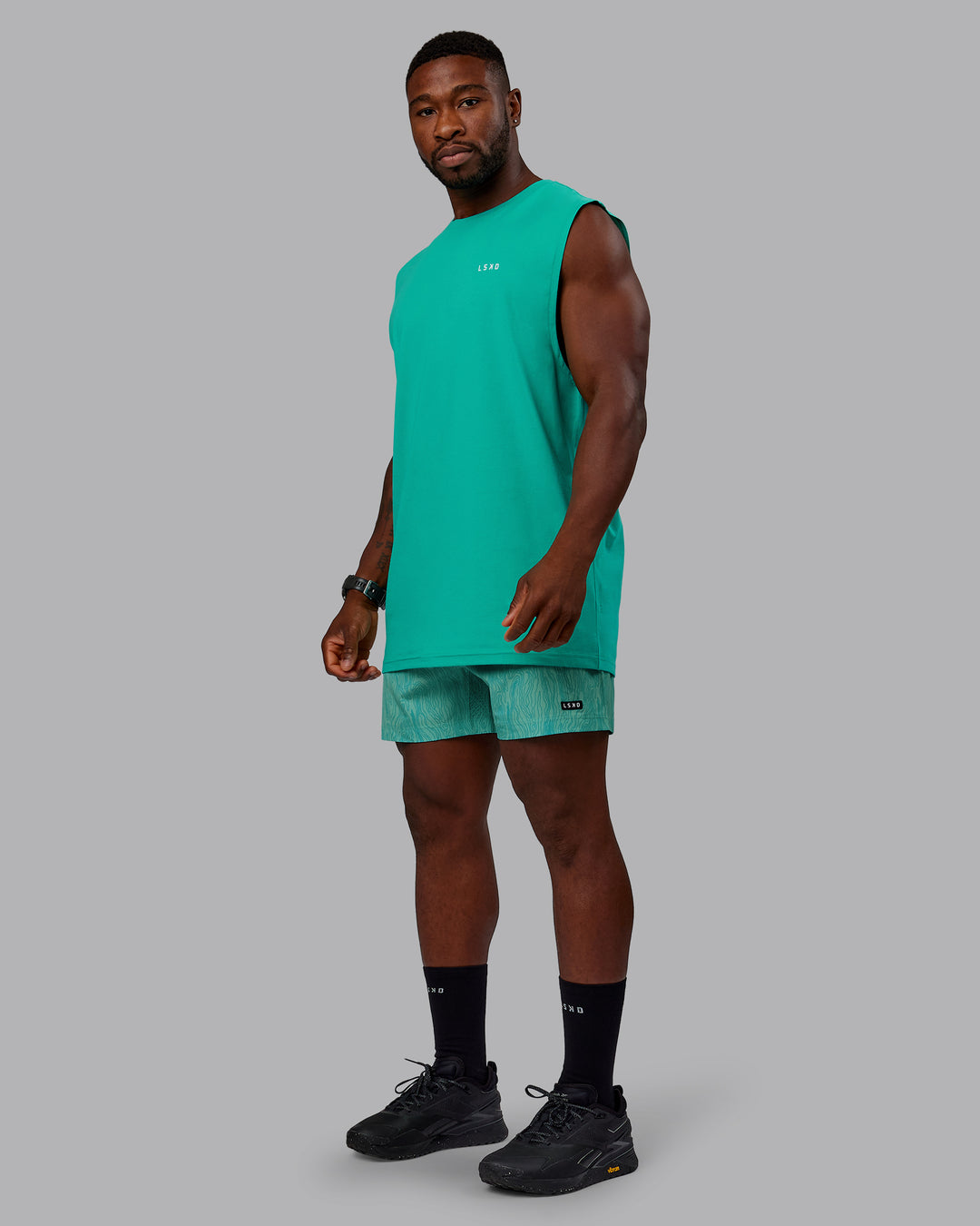 Man wearing Rep 5" Performance Shorts - Topographic Blue Bird - view 4
