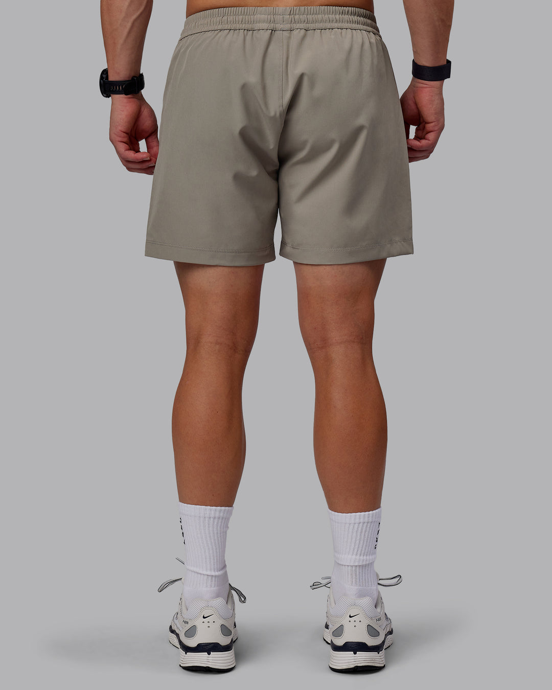 Man wearing Rep 5" Performance Shorts - Elephant - view 3