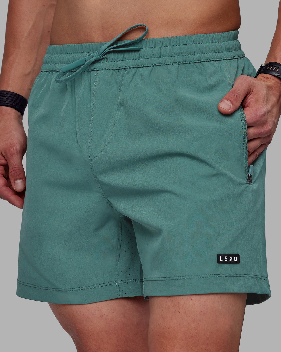 Man wearing Rep 5" Performance Shorts - Sage Bush - view 5