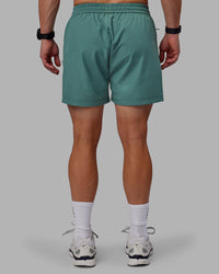 Man wearing Rep 5" Performance Shorts - Sage Bush | Thumbnail Index: 2
