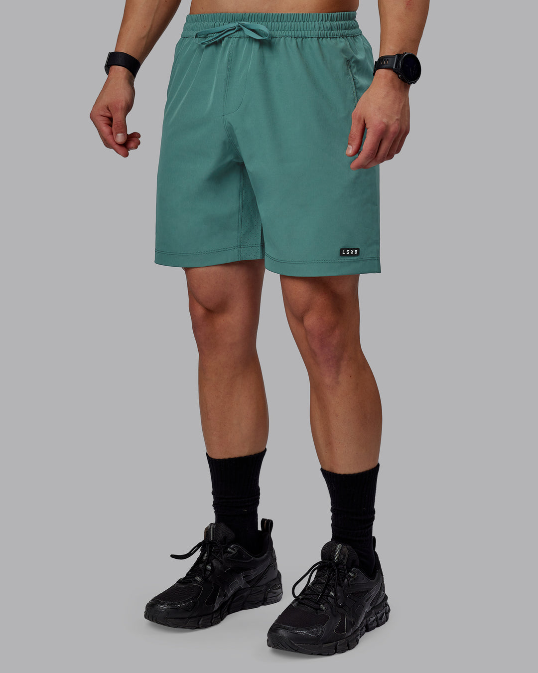 Man wearing Rep 7" Performance Shorts - Sage Bush - view 3