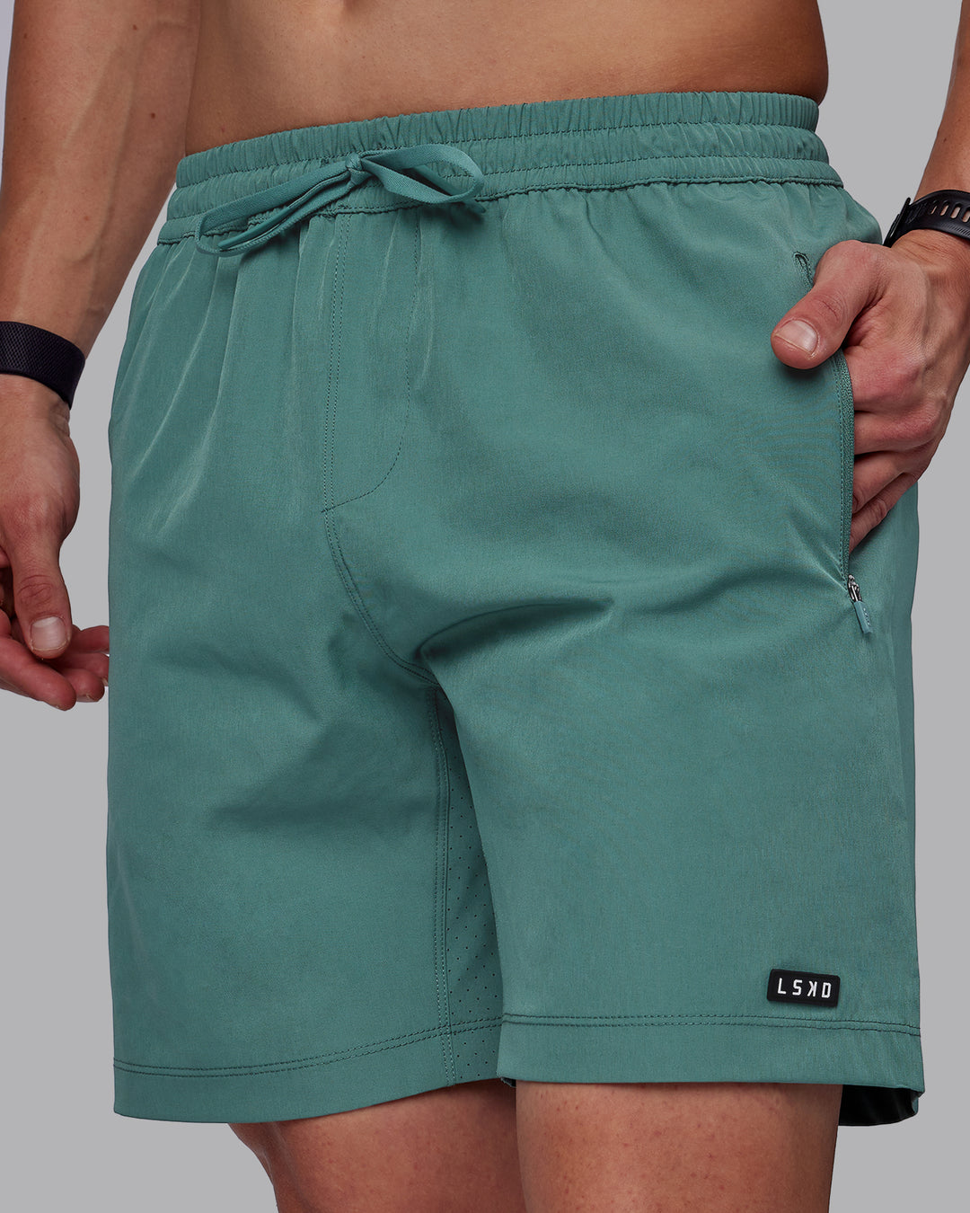 Man wearing Rep 7" Performance Shorts - Sage Bush - view 1