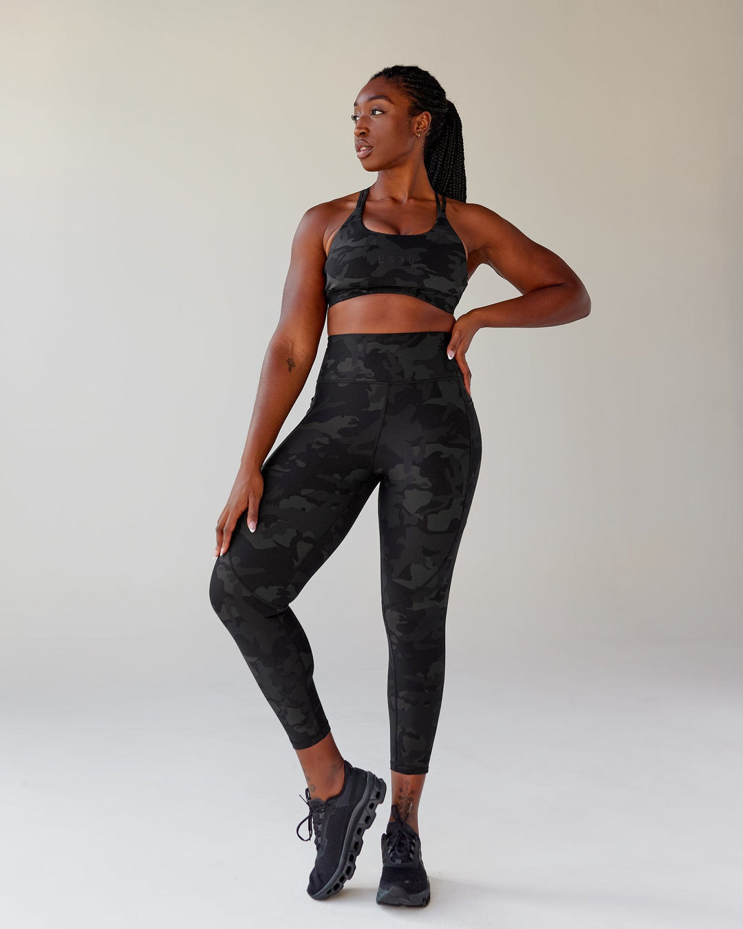 Woman wearing Rep Ultra High-Rise 7/8 Legging Pockets - Black Camo | Model:Krystal | Size:L - view 1