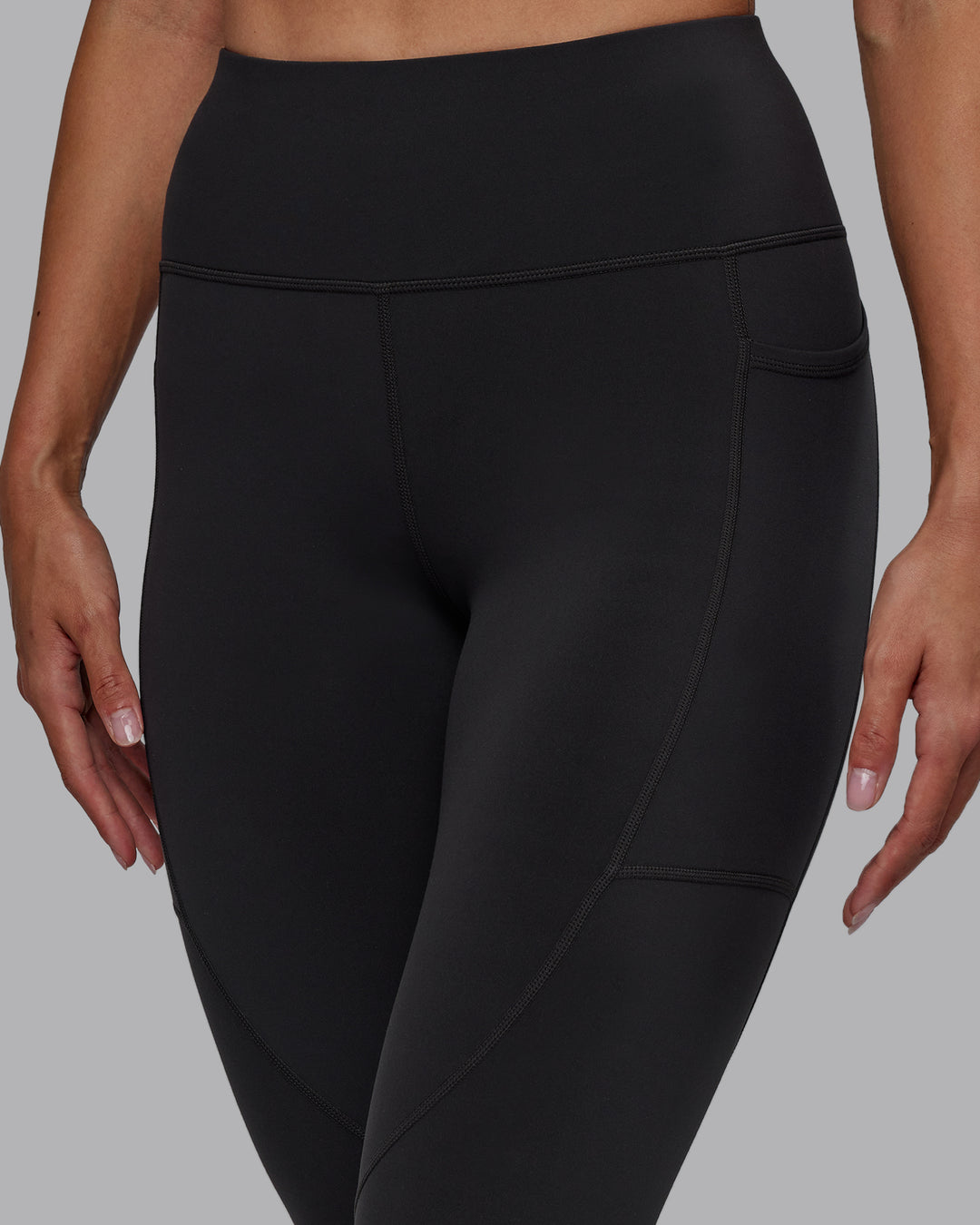 Woman wearing Rep Ultra High-Rise 7/8 Legging Pockets - Pirate Black-White | Model:Blaize | Size:S - view 5