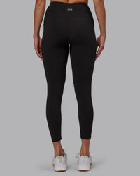 Woman wearing Rep Ultra High-Rise 7/8 Legging Pockets - Pirate Black-White | Model:Blaize | Size:S | Thumbnail Index: 5