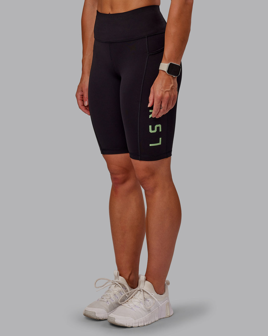 Woman wearing Rep Ultra High-Rise 9" Short Pockets - Black-Surreal Green | Model:Amber | Size:S - view 7