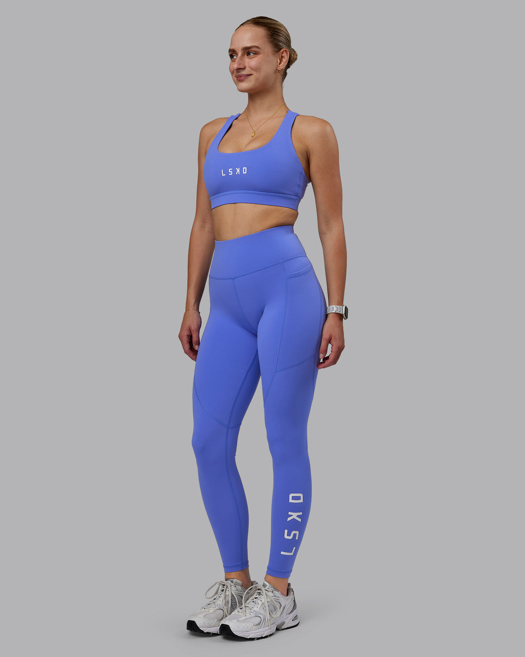 Woman wearing Rep Ultra High-Rise Full Length Legging Pockets - Baja Blue-White | Model:Lillie | Size:S - view 1