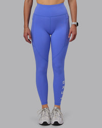 Woman wearing Rep Ultra High-Rise Full Length Legging Pockets - Baja Blue-White | Model:Lillie | Size:S | Thumbnail Index: 1