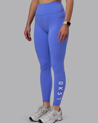 Woman wearing Rep Ultra High-Rise Full Length Legging Pockets - Baja Blue-White | Model:Lillie | Size:S | Thumbnail Index: 4