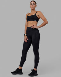 Woman wearing Rep Ultra High-Rise Full Length Legging Pockets - Black-Black | Model:Shae | Size:S | Thumbnail Index: 6