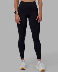 Woman wearing Rep Ultra High-Rise Full Length Legging Pockets - Black-White | Model:Shae | Size:S | Thumbnail Index: 9
