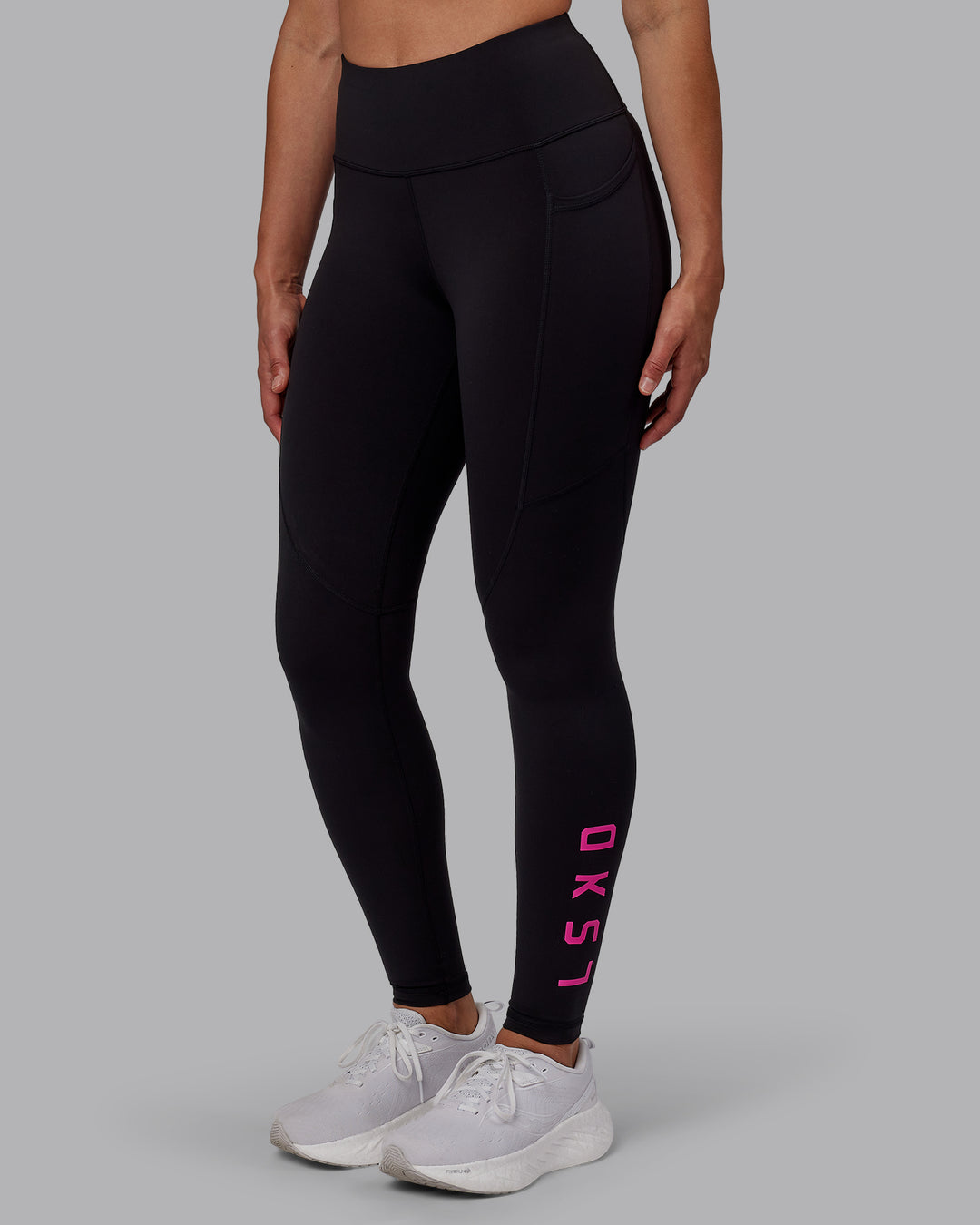 Woman wearing Rep Ultra High-Rise Full Length Legging Pockets - Black-Fuchsia Pink | Model:Sophie | Size:S - view 1