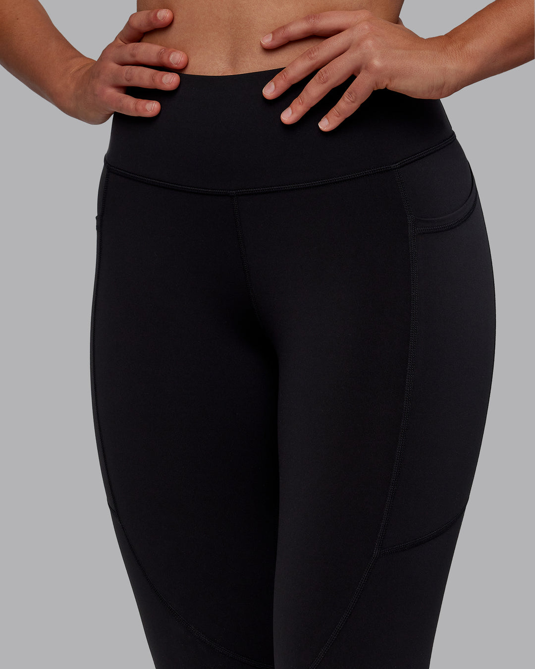 Woman wearing Rep Ultra High-Rise Full Length Legging Pockets - Black-Fuchsia Pink | Model:Sophie | Size:S - view 3