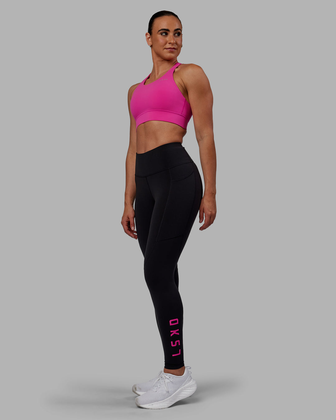 Woman wearing Rep Ultra High-Rise Full Length Legging Pockets - Black-Fuchsia Pink | Model:Sophie | Size:S - view 5