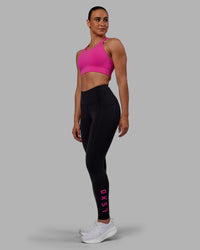 Woman wearing Rep Ultra High-Rise Full Length Legging Pockets - Black-Fuchsia Pink | Model:Sophie | Size:S | Thumbnail Index: 4
